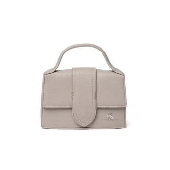 Geanta de dama  roz - din piele ecologica - cu curea reglabila - dimensiuni compacte